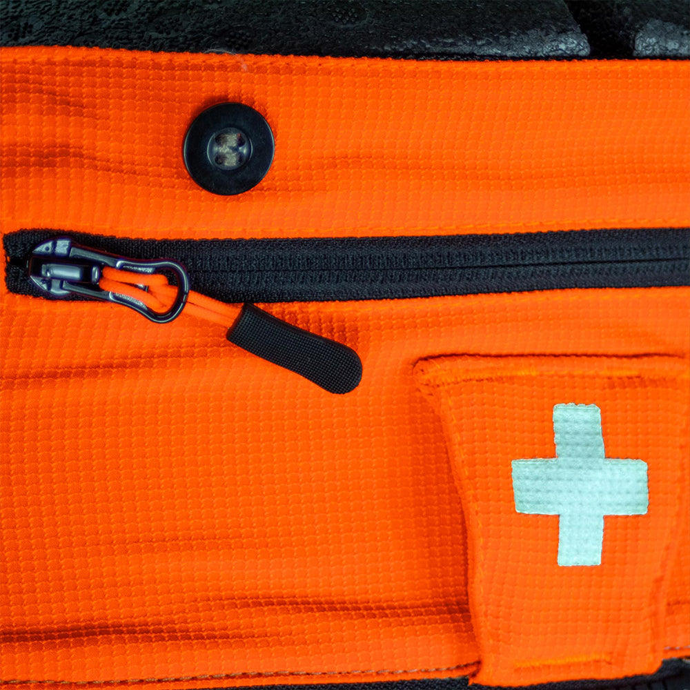 first aid and hi-vis detail of solidur Breathable Class 1 Design A chainsaw trousers for hot weather. Mesh vents, CoolMax lining, stretch fabric. Standard and long leg. Mower City Albury.