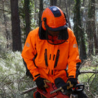 In action Solidur Waterproof, breathable orange work jacket rated EN 343 Class 3. Hood fits over a helmet, taped seams, 7 pockets. Mower City Albury.