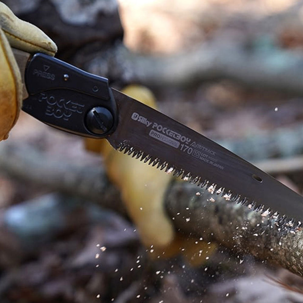 Discover the Outback Silky Saw Pocket Boy at Mower City Albury. Designed for hard work with a wood particle and rubber handle for a secure grip. Cuts through wood and bone effortlessly. Compact, lightweight, and corrosion-resistant with a 170mm straight blade. Your ultimate adventure companion! Buy today. in action