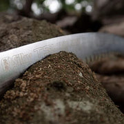 Experience the Tsurugi tree saw at Mower City Albury. Its super-slender "spine of teeth" effortlessly cuts hard-to-soft wood in tight spots. Lightweight, aggressive, and screw-free design. Small to medium branch pruning. Special rubber handles for vibration absorption and a secure grip, even in damp conditions. action
