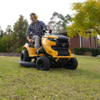 A man riding a Cub Cadet Enduro XT2 42 K ride-on mower with 21.5HP Kawasaki V-Twin engine and 42-inch fabricated deck, suited to large blocks and small acreage. Mower City Albury - wodonga