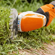 Keep your garden looking sharp with the STIHL HSA 26 Garden Shears Set. Lightweight, cordless, and easy to use for trimming grass or shrubs. Buy online from Mower City Albury – servicing Albury-Wodonga region. trimming lawns with ease