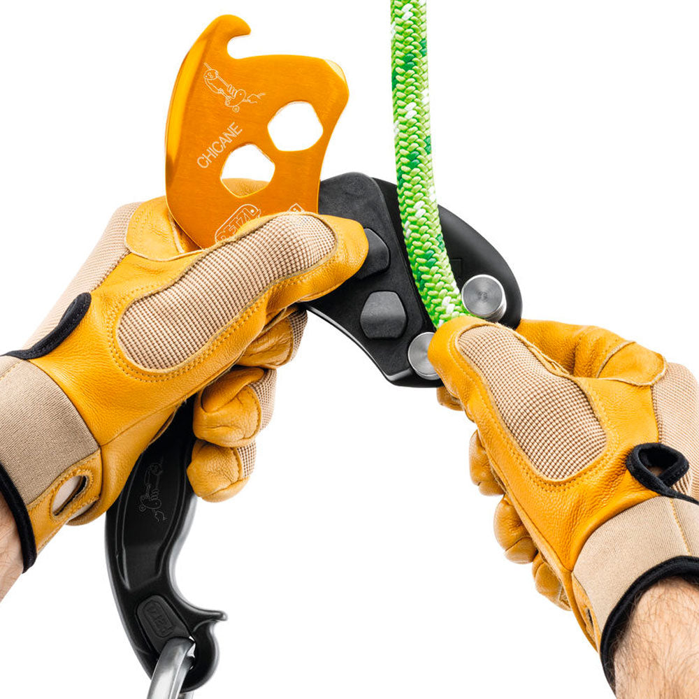 Enhance your climbing efficiency with the Petzl Chicane braking device. Compatible with Zigzag and Zigzag Plus Prusiks, it offers continuous friction on descents. Find it at Mower City Albury - come in-store today for all your climbing equipment and clothing needs. In use