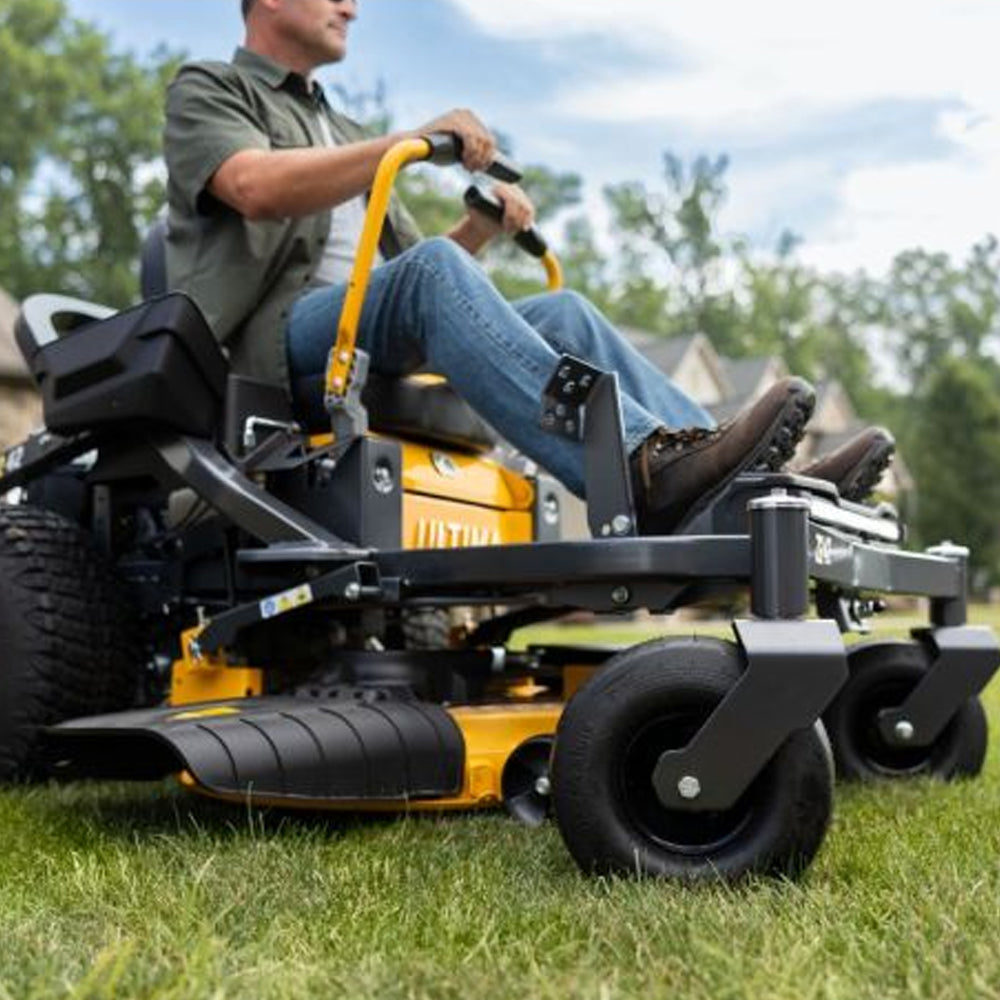 Man riding Cub Cadet Ultima Z2 42 zero-turn mower with 21.5HP Kawasaki engine and 42-inch fabricated deck. Built for blocks up to four acres. Available at Mower City Albury. Close up
