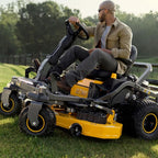 close up view of a man driving Cub Cadet Ultima Z3 54 S zero-turn ride-on mower with a 24 HP Kawasaki engine, 54-inch fabricated deck and Syncro Steer. Talk to Mower City Albury.