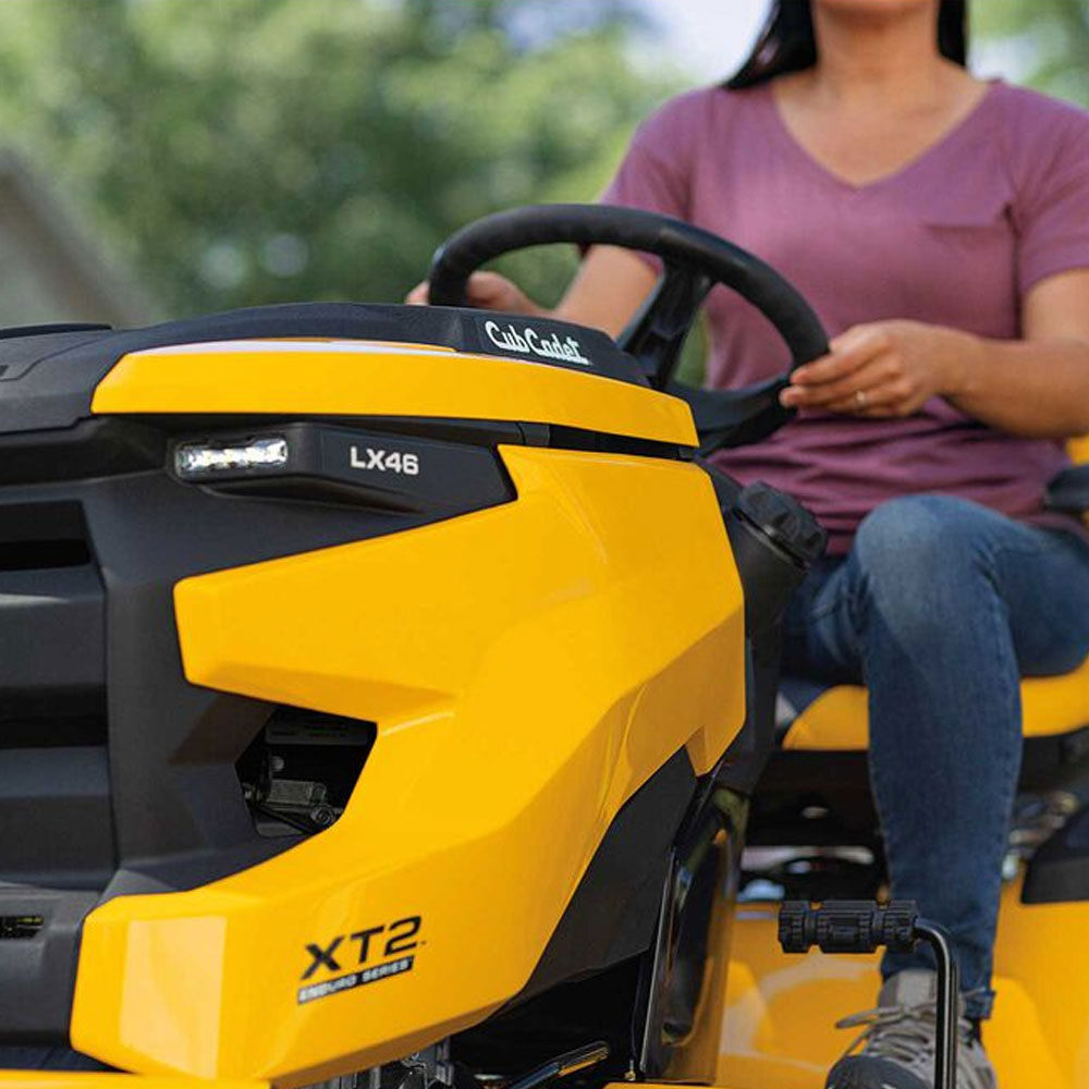 Cub Cadet ride on mower Enduro XT2 LX 46. Big on power-built for tough jobs. Big blocks to med. acreage. Highback seat, armrests, cup holder. Auto hydro transmission, cruise control. Easy blades engage & disengage, 46"deck. Anti-scalp wheels protects from uneven terrain. 679cc EFI engine,12 Cut heights. SmartJetª deck wash. 6 Year Warranty 123